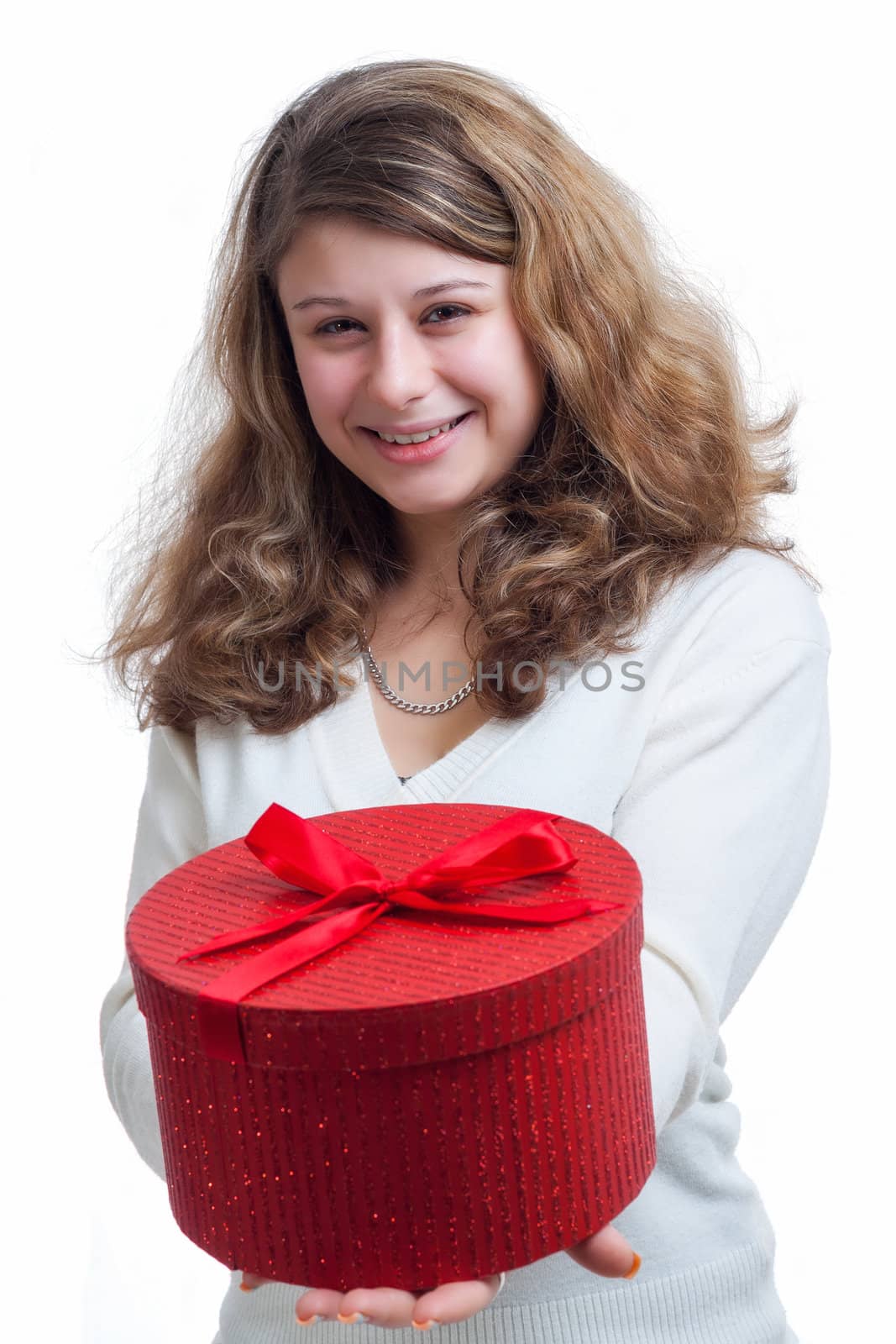 beautiful smiling blond woman holding a red gift box isolated on white 