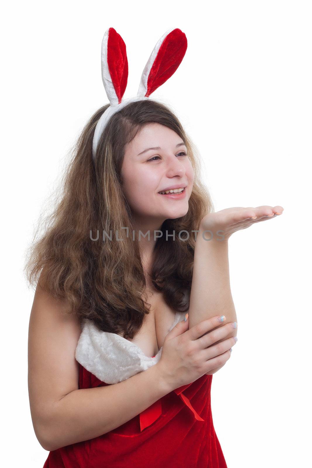 Christmas Woman blowing something on red background