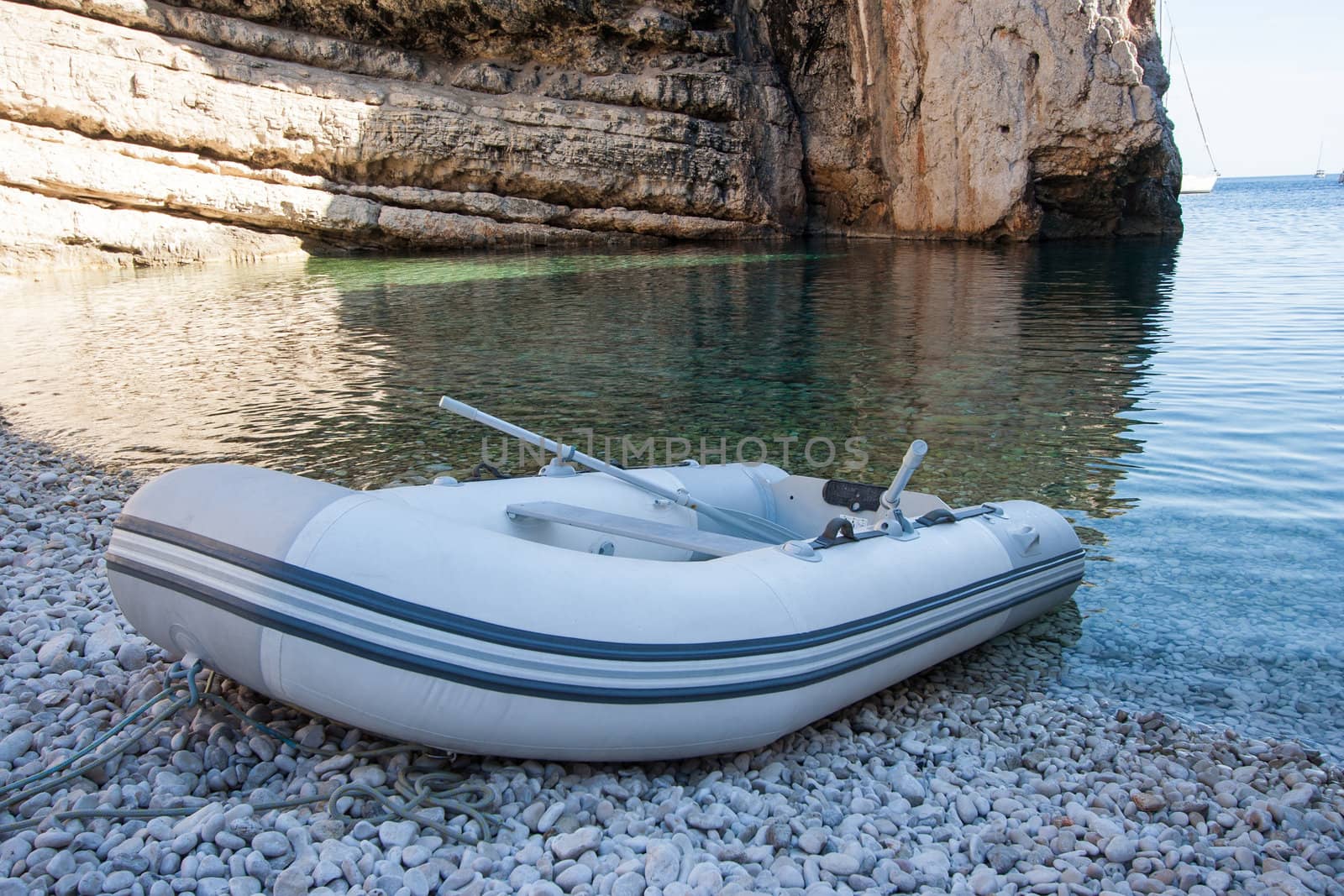 White boat on the beach in Stiniva bay