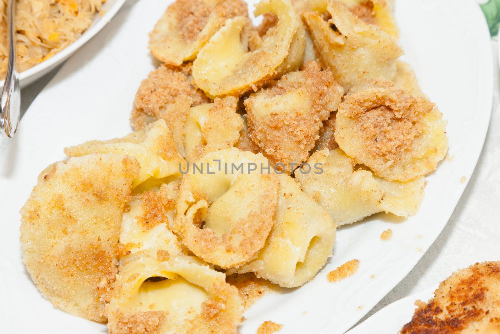 Uszka are small dumplings (a very small and twisted version of pierogi) usually filled with flavoursome wild forest mushrooms and/or minced meat.