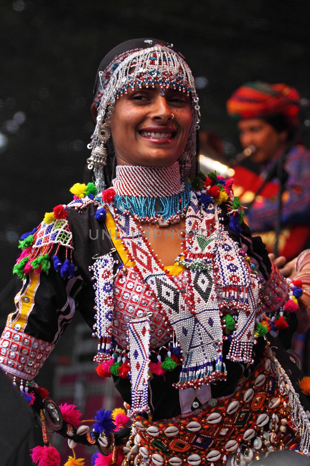 BRISTOL, ENGLAND - JULY 31: Dancer with the Jaipur Kawa brass band performing at the Harbour Festival in Bristol, England on July 31, 2010. Founded in 1971, this free three day event played host to more than 250,000 spectators