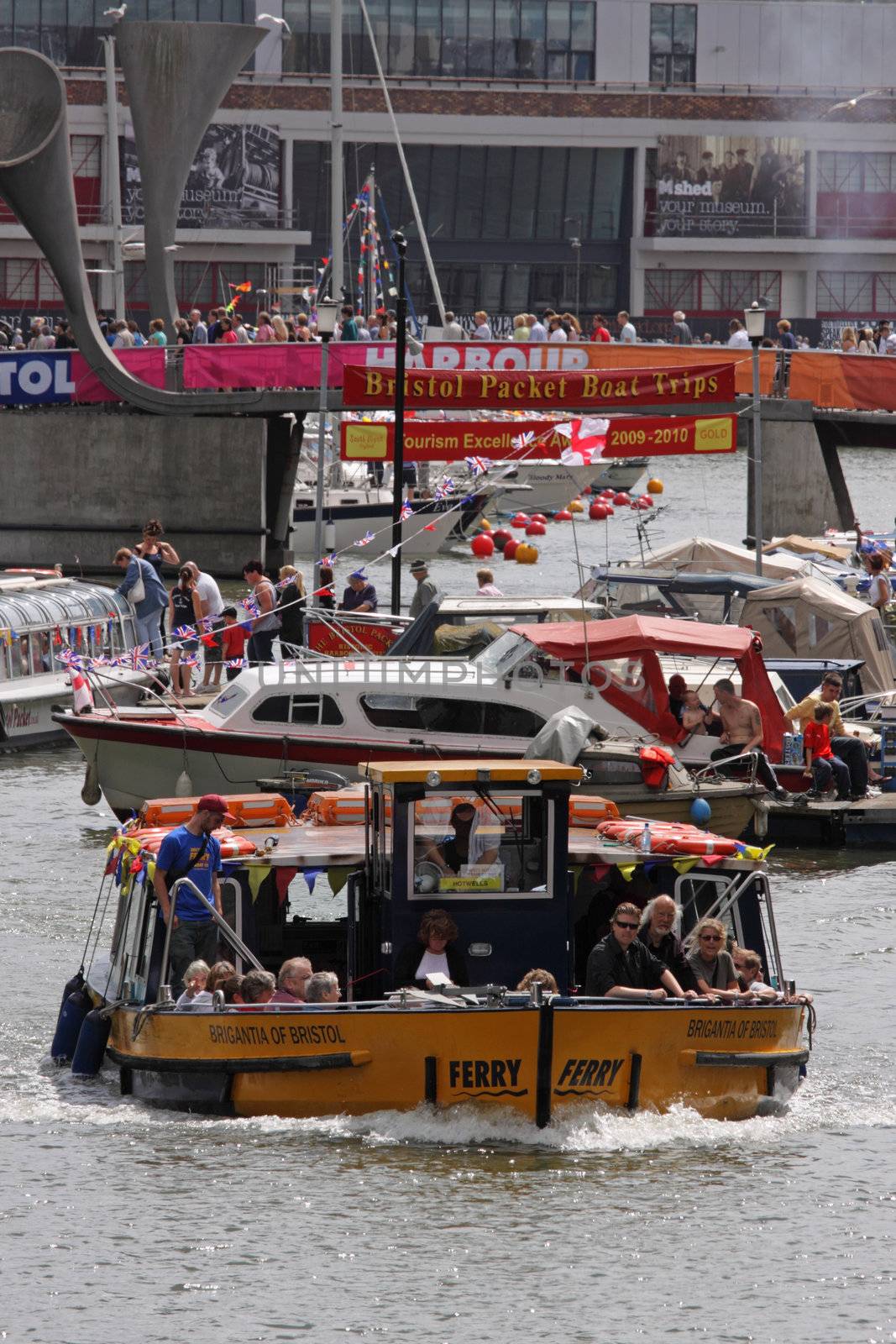 BRISTOL, ENGLAND - JULY 31: Crowds flocked to the harbour for this year’s festival  in Bristol, England on July 31, 2010. Founded in 1971, the free three day event played host to more than 250,000 spectators