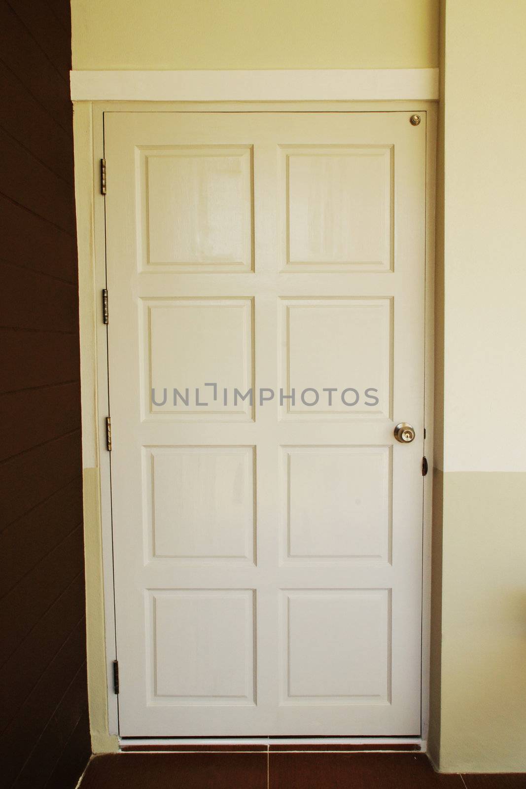 the white wood door in a  house