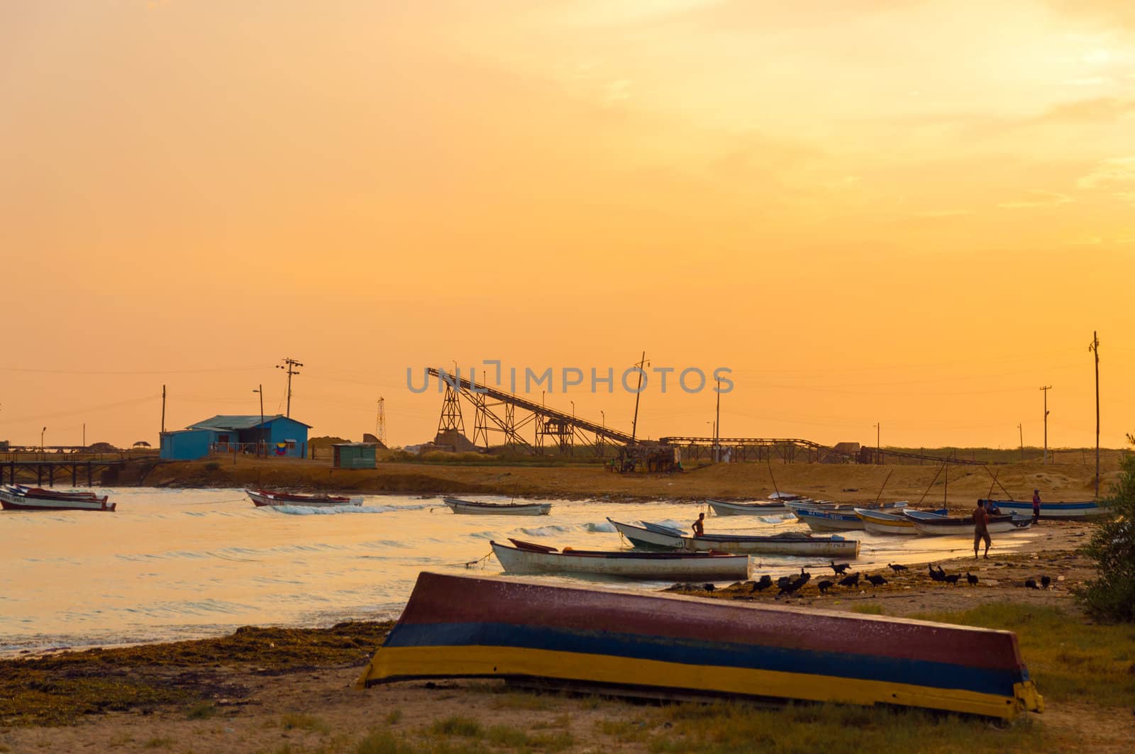 Boats on the shore early in the morning in Manaure, Colombia