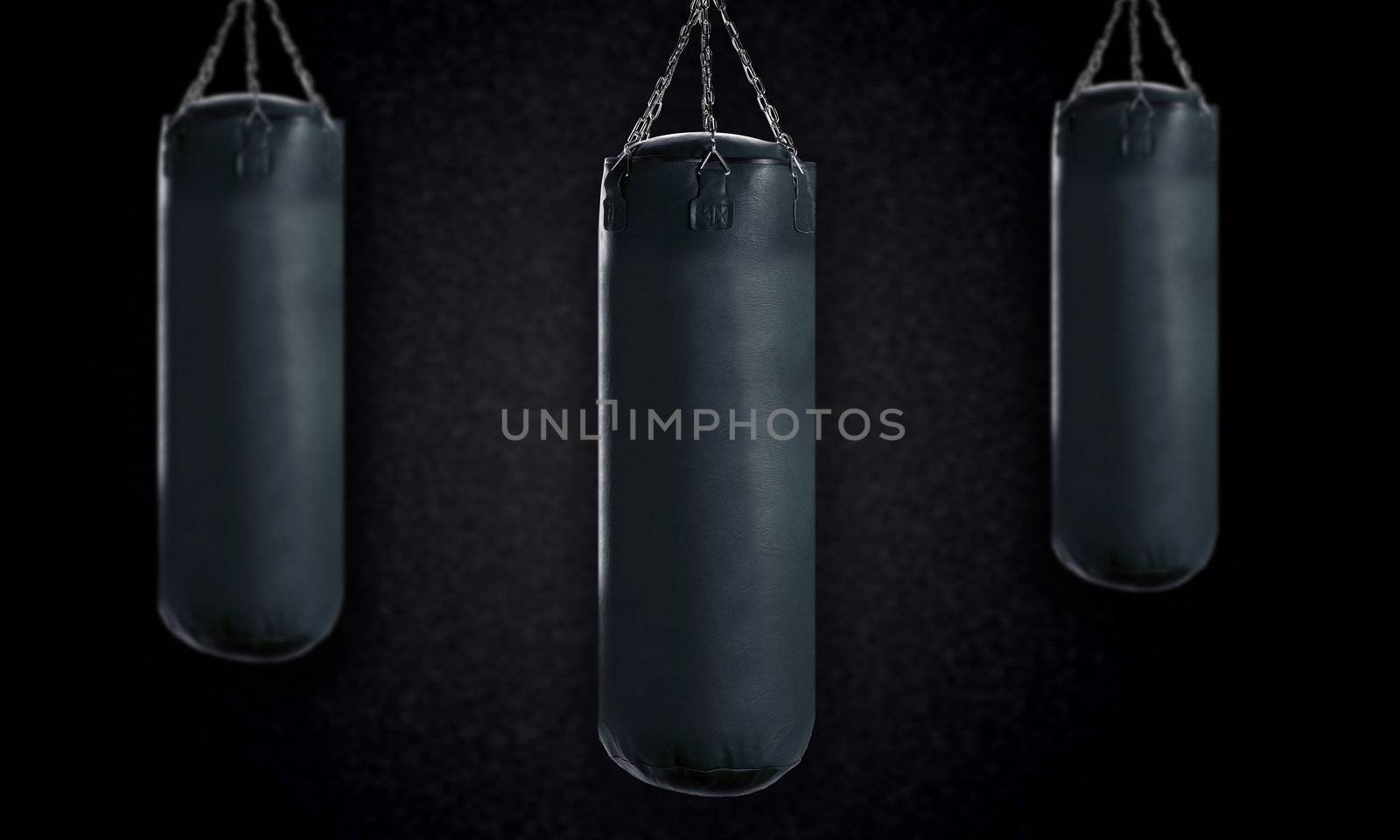 black Punching bag for boxing or kick boxing sport.