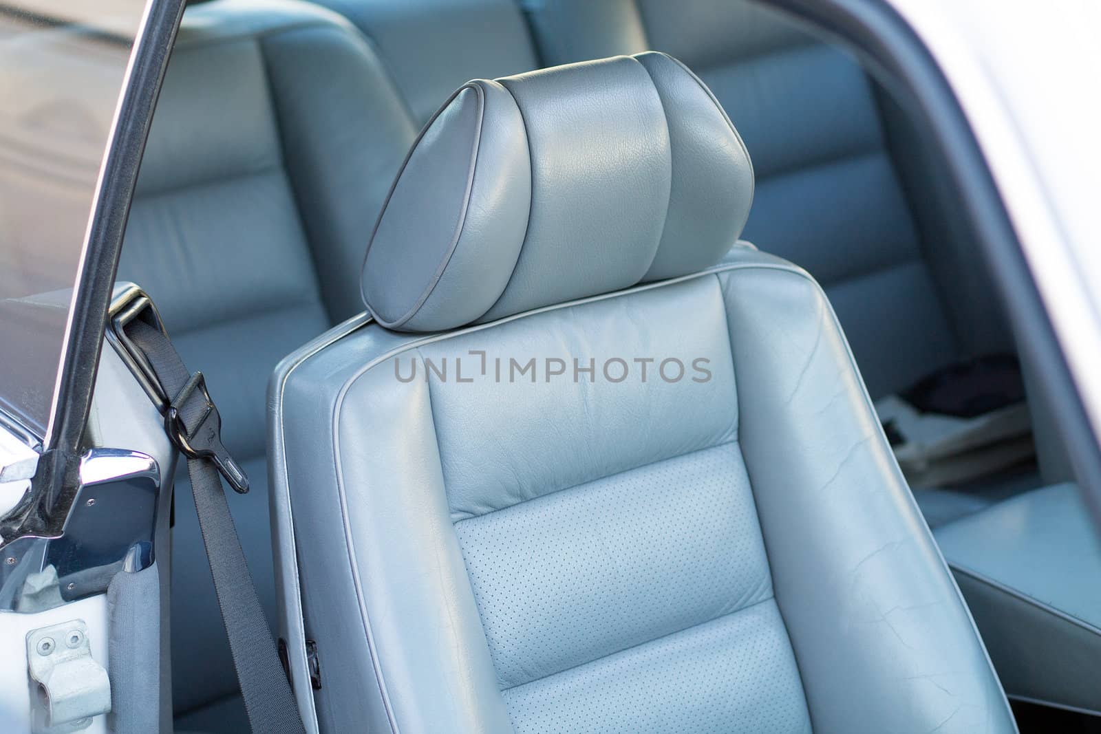 grey leather seat in a luxury car