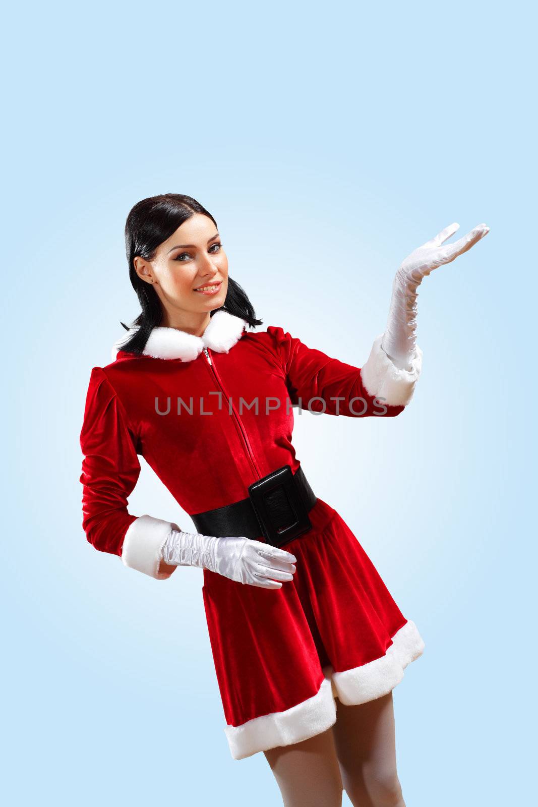 Santa Girl presenting your product, in costume and white gloves