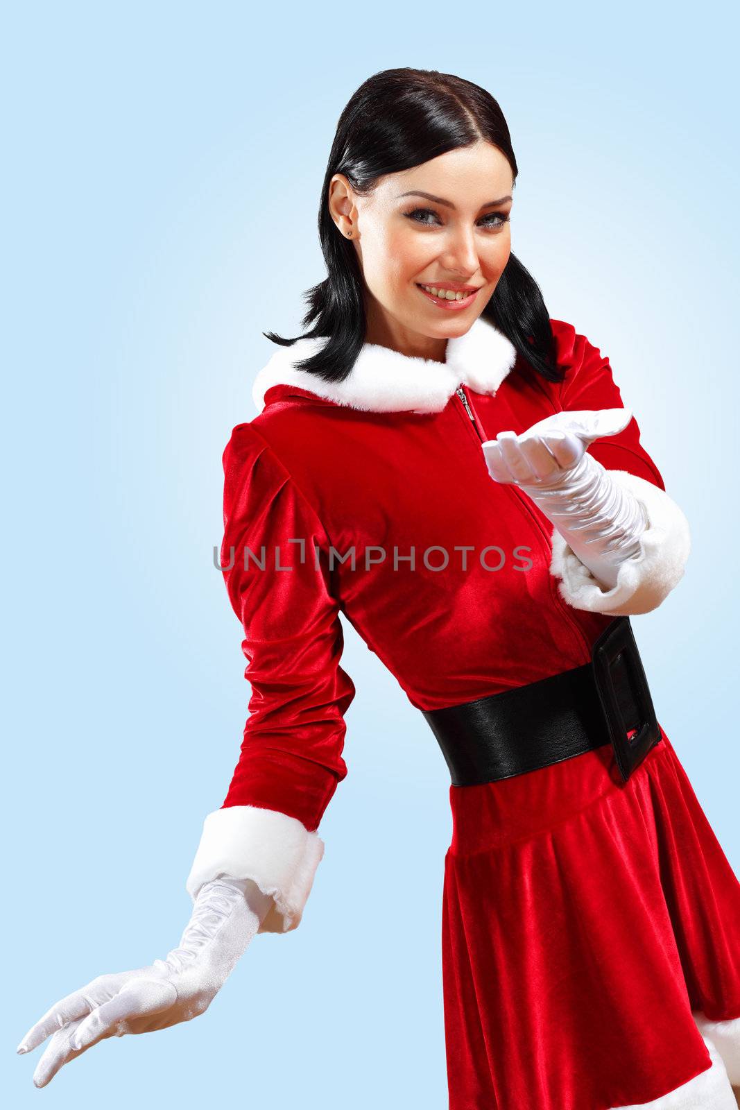 Santa Girl presenting your product, in costume and white gloves