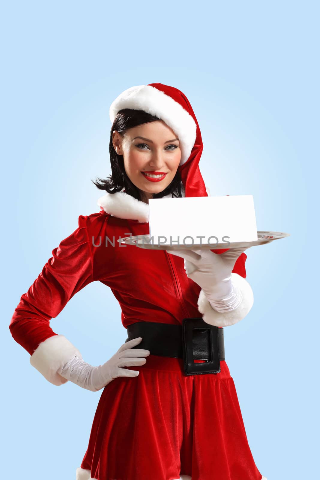 Portrait of a santa girl with a blank banner