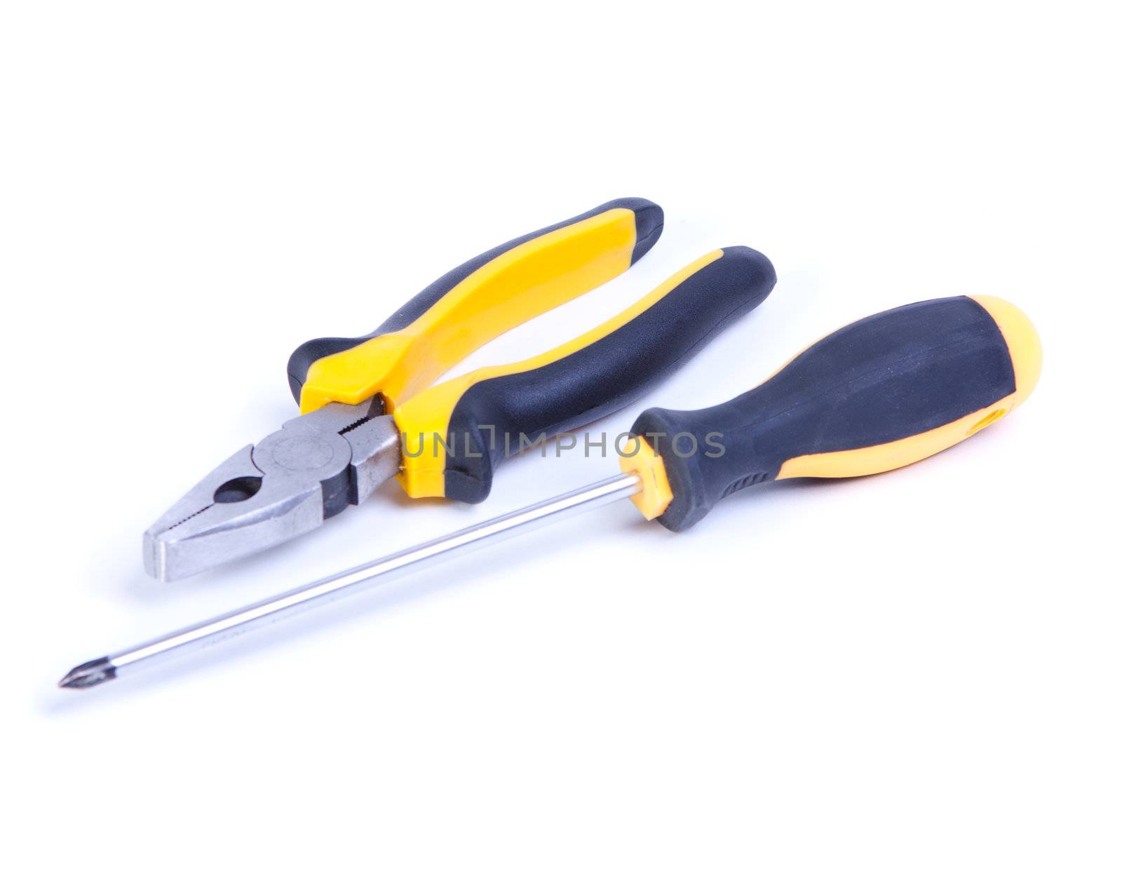 screwdriver and pliers isolated on white background