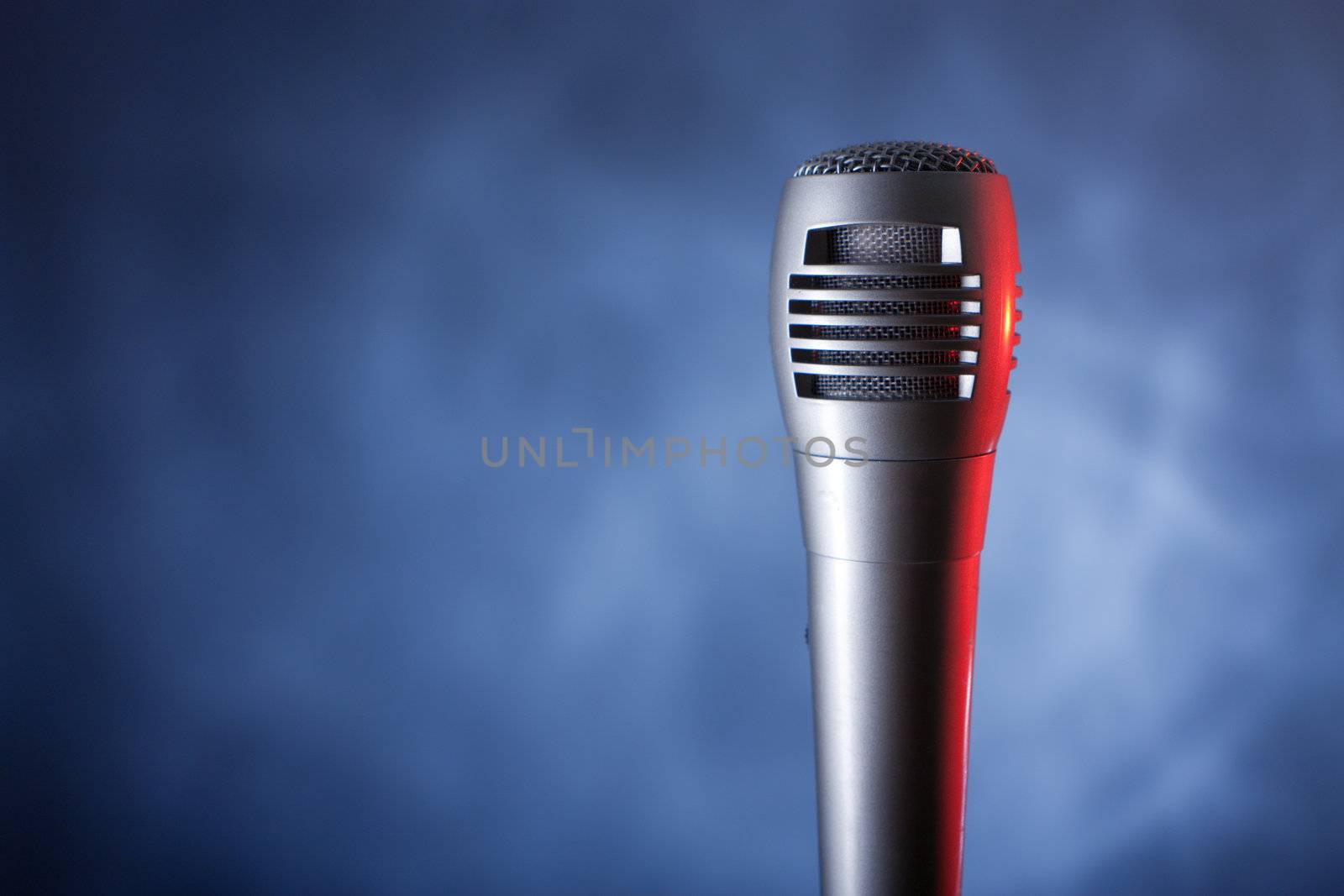 microphone with copyspace on the dark background