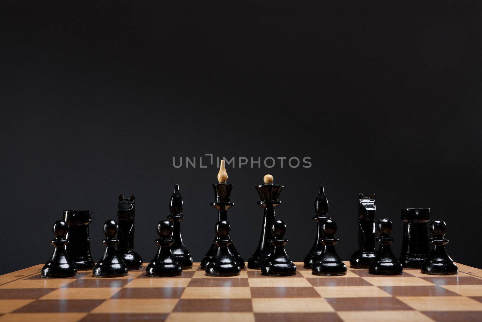 chess piece on board dark background