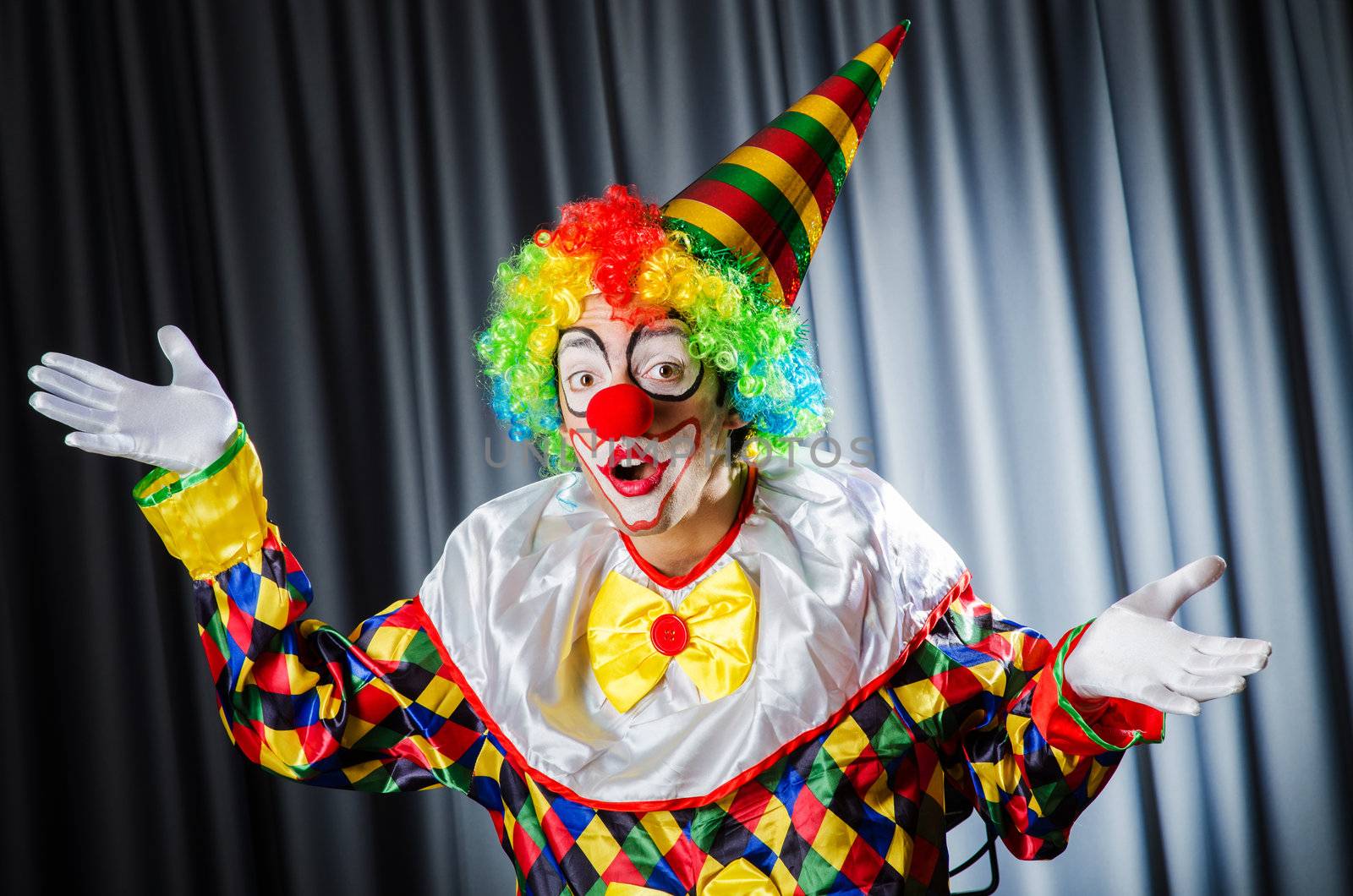 Funny clown in studio shooting by Elnur