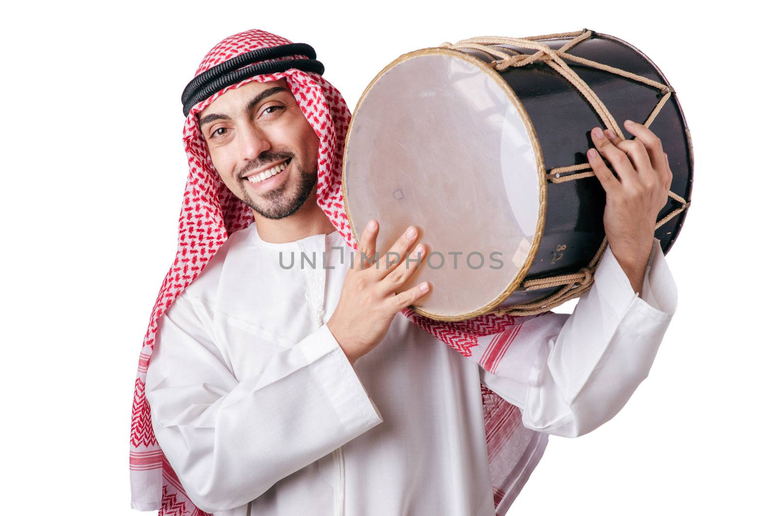 Arab man playing drum isolated on white by Elnur