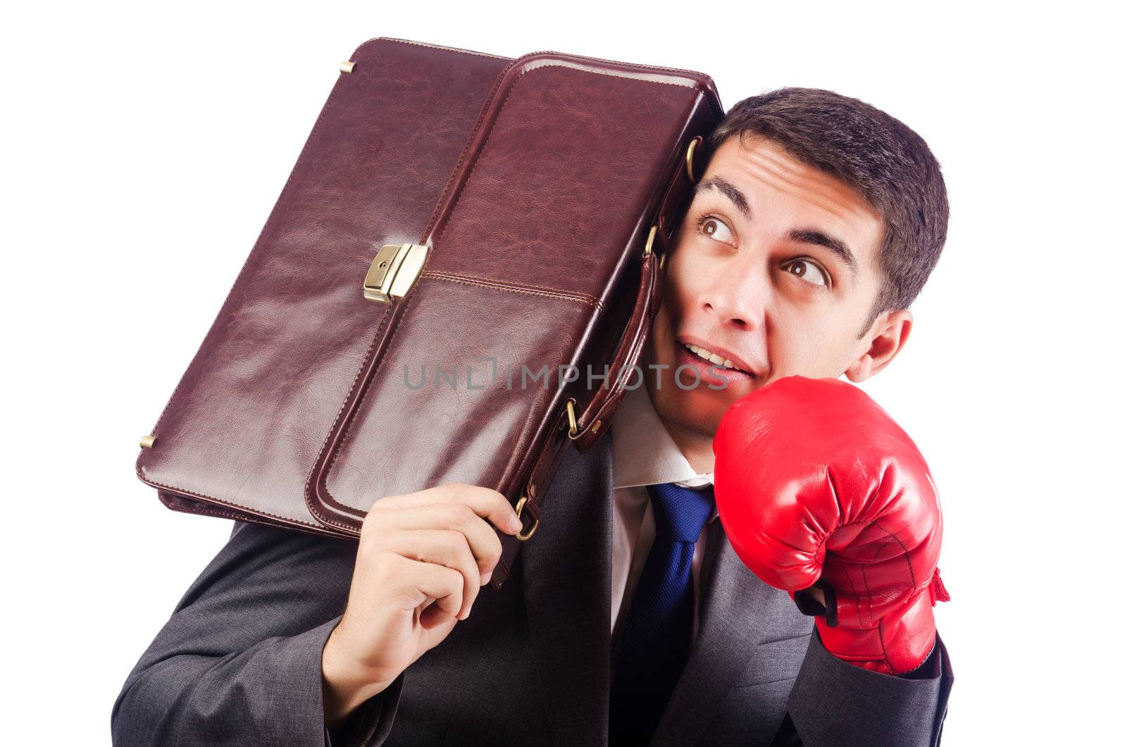 Businessman with boxing gloves on white by Elnur