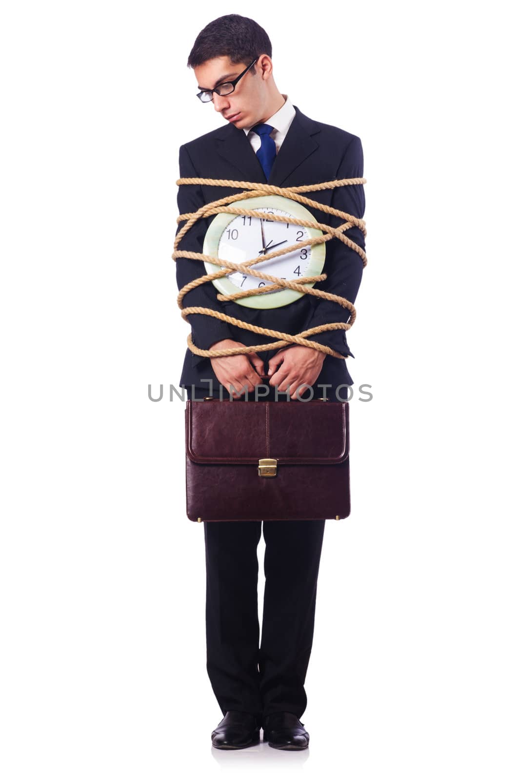 Businessman tied up with rope on white
