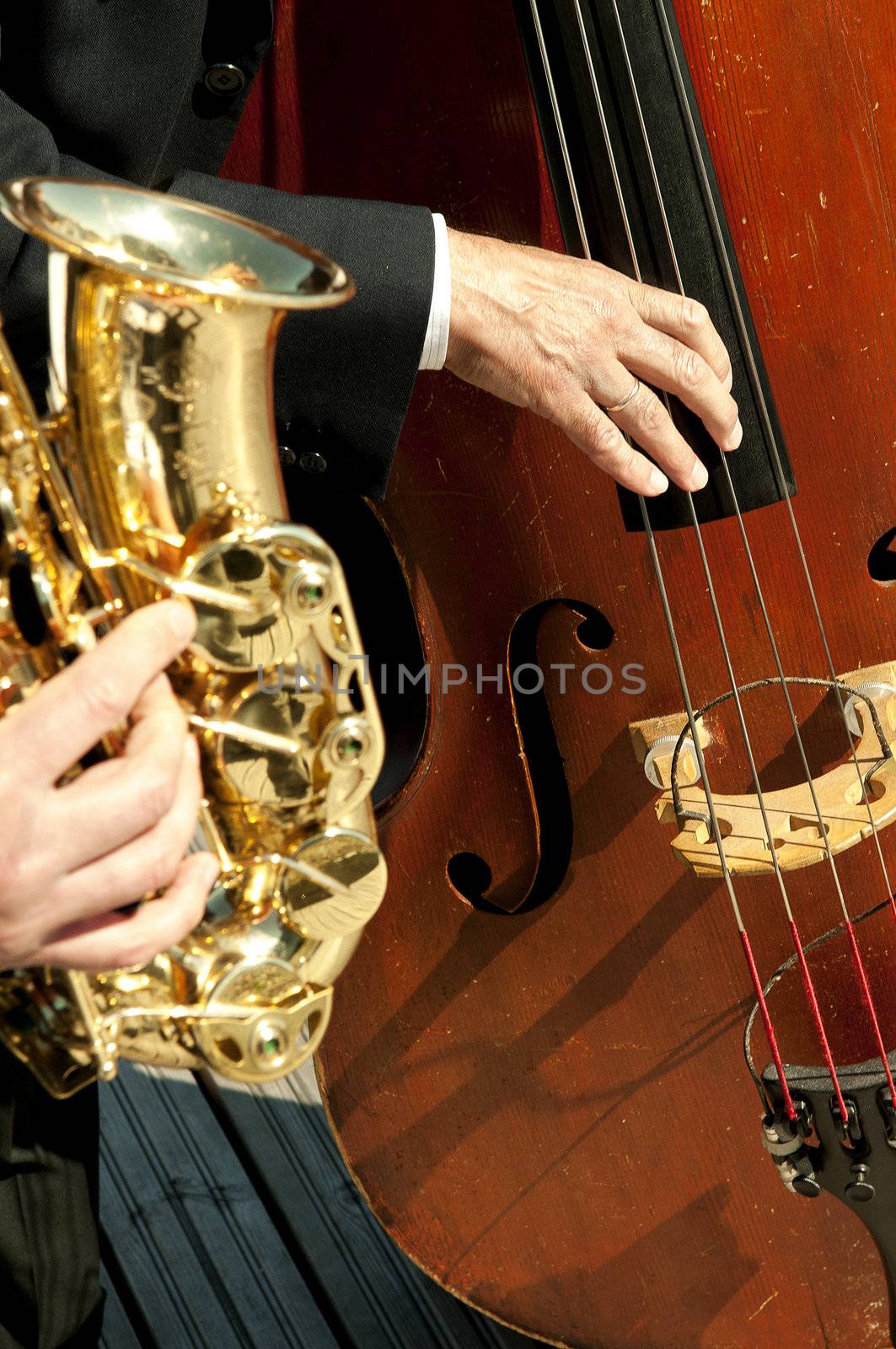 street musicians playing instruments in the sun