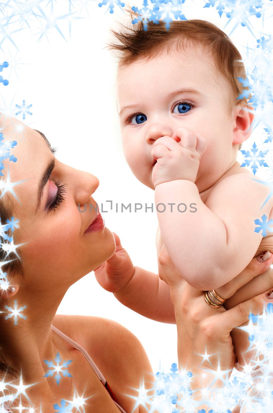 picture of happy mother with baby and snowflakes