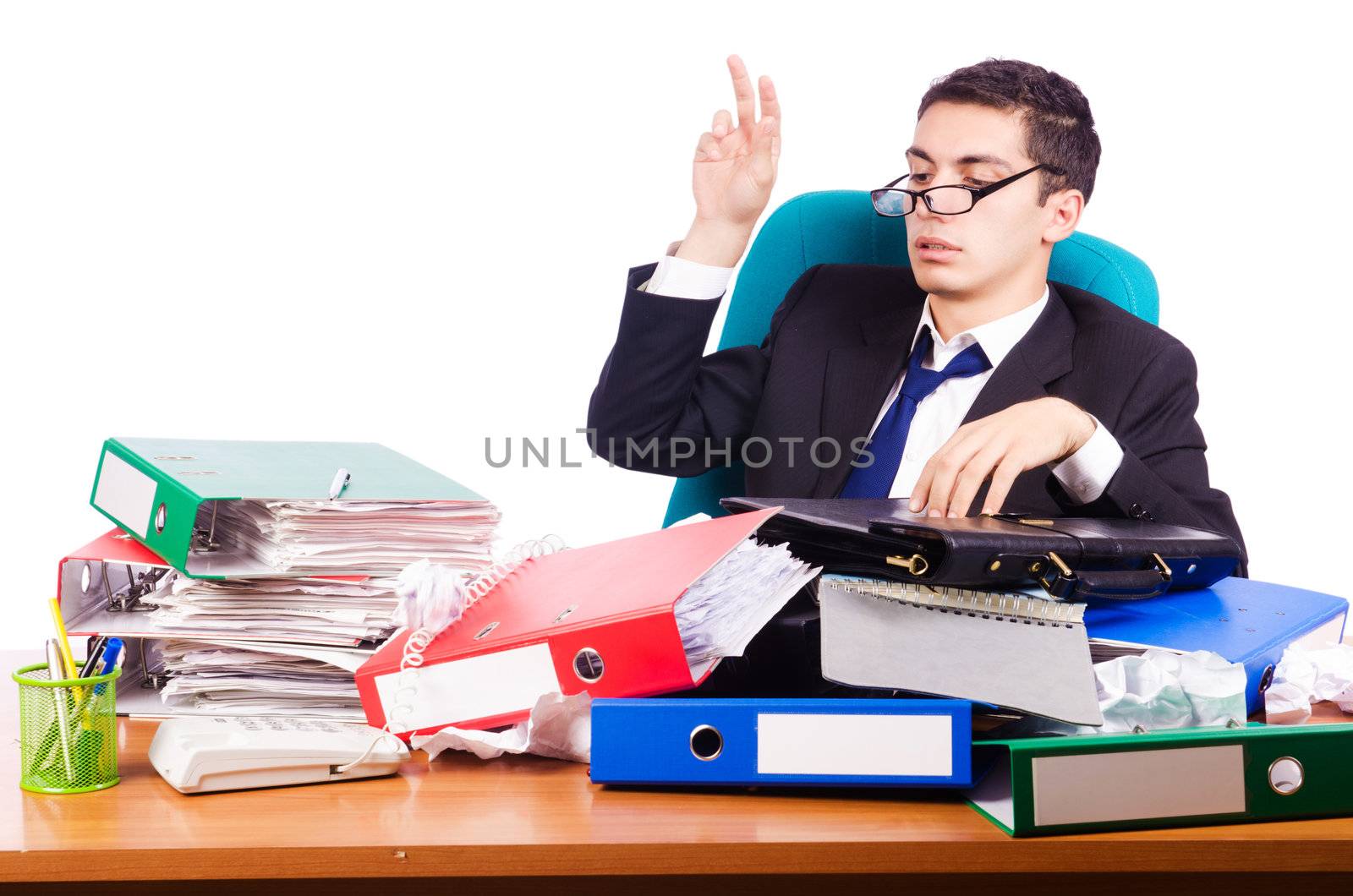 Busy stressed man in the office
