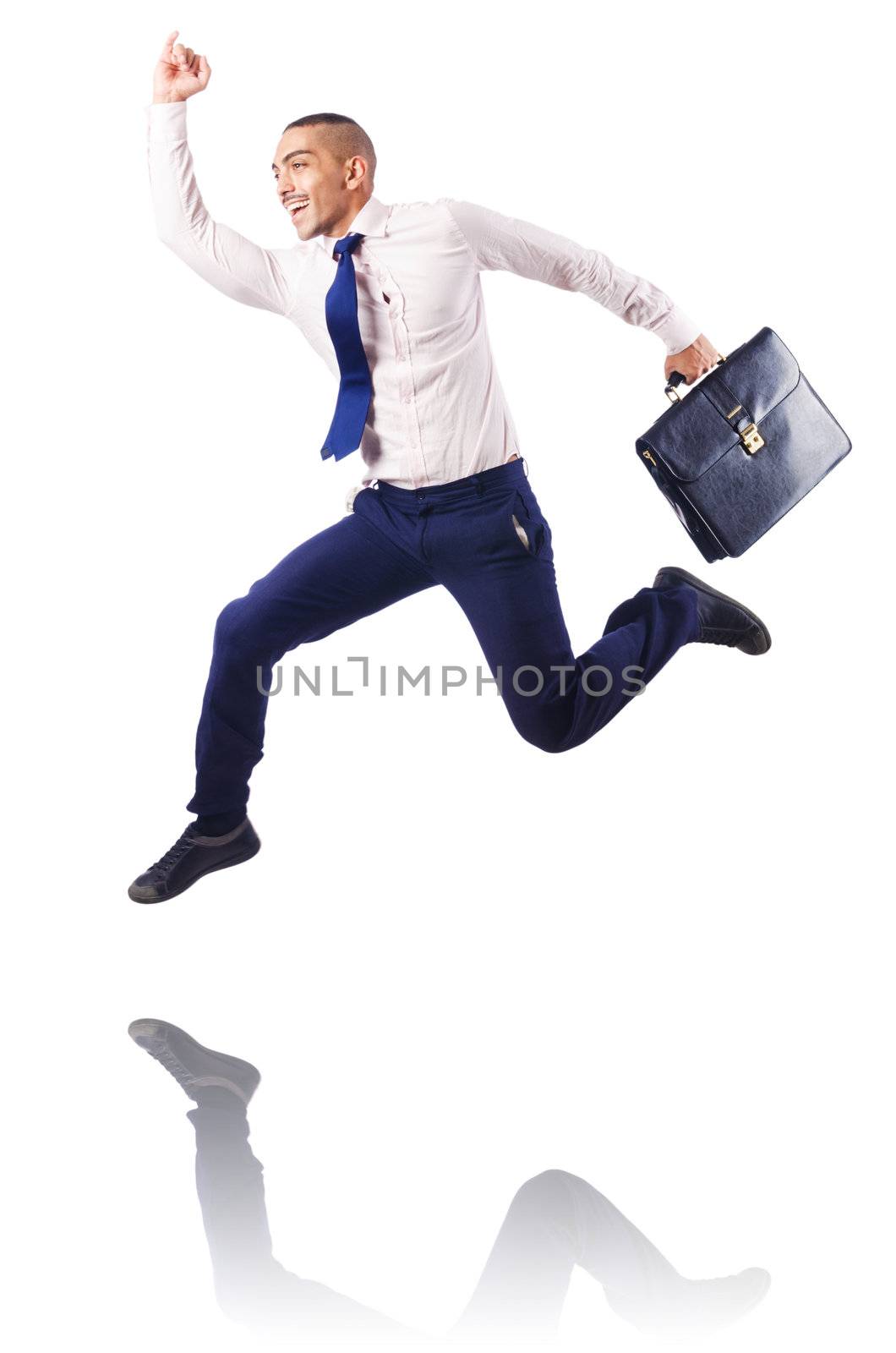 Muscular half naked businessman jumping on white by Elnur