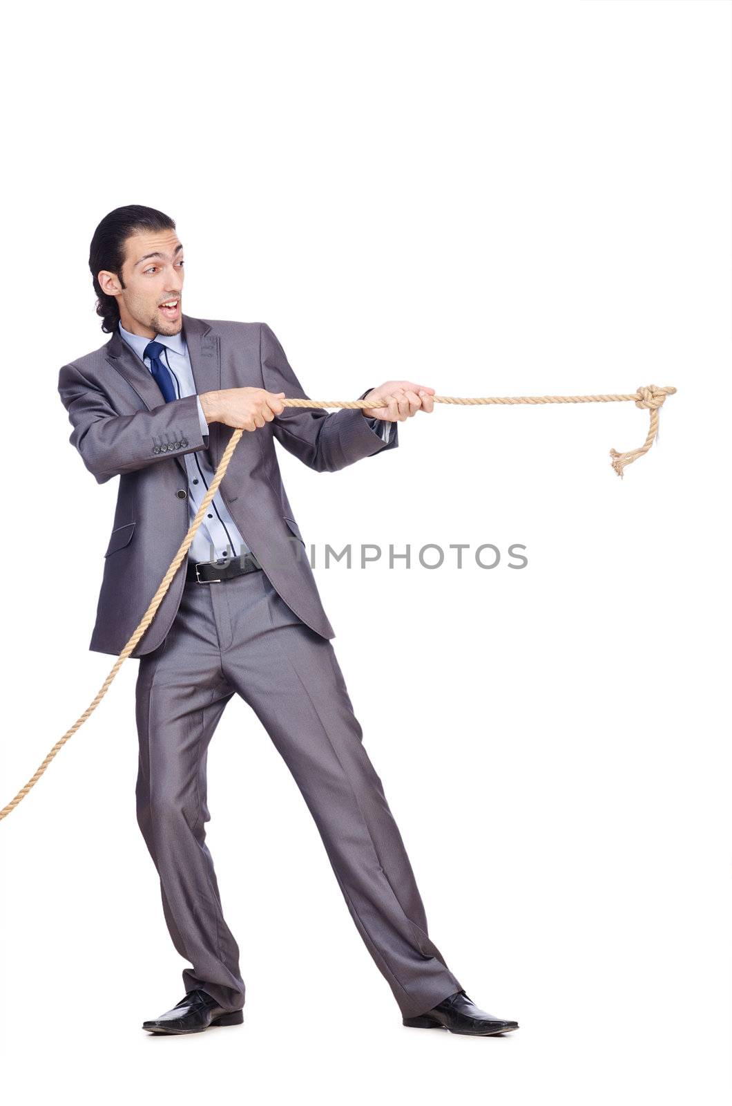 Businessman pulling rope on white by Elnur