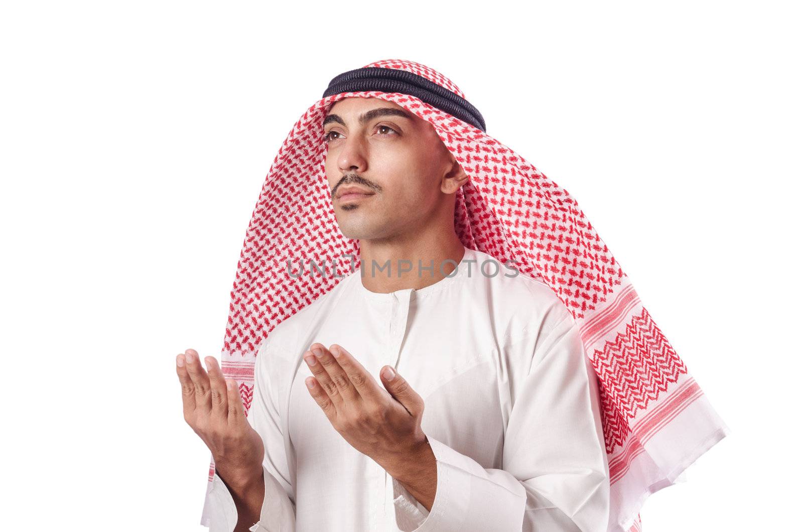 Arab man praying on white by Elnur