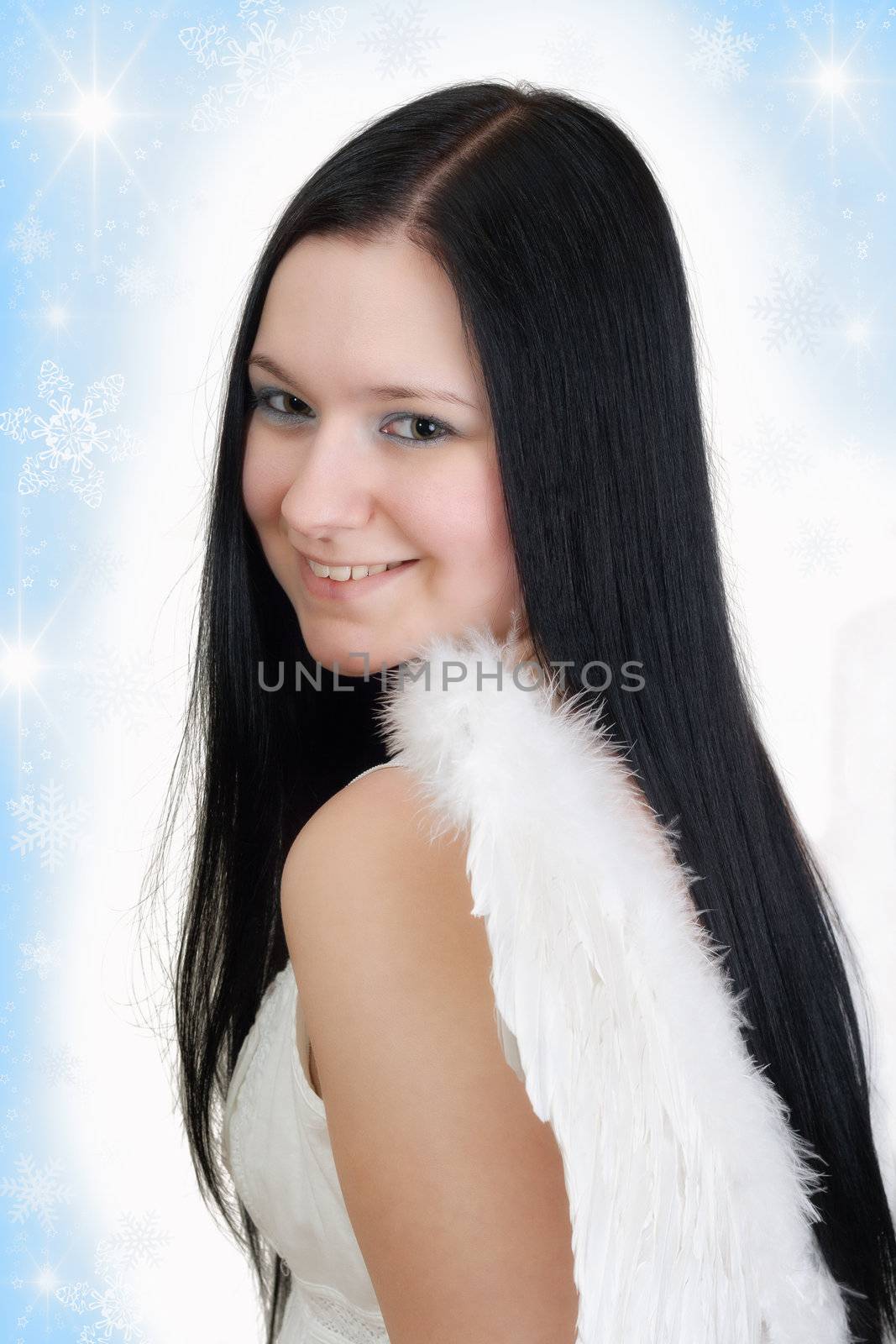 innocence christmas angel with black hair and wings on white blue background with stars and snow looking shy