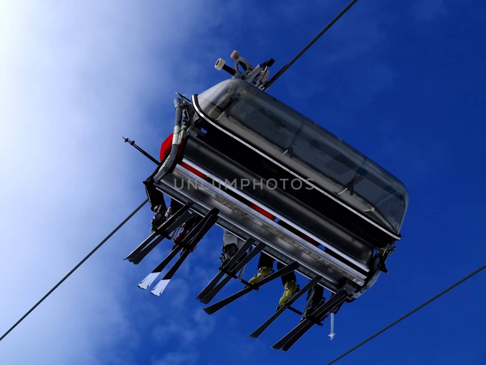 A ski lift carrying skiers.