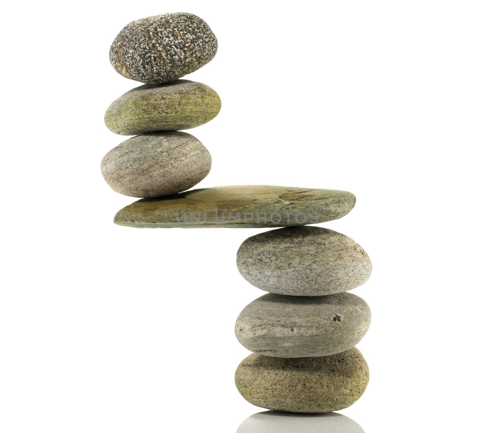 stones in perfect balance isolated on white