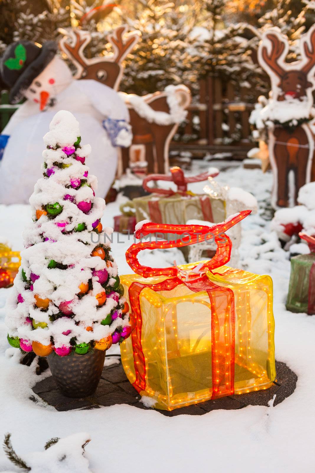 Outdoor Christmas light display in the snow