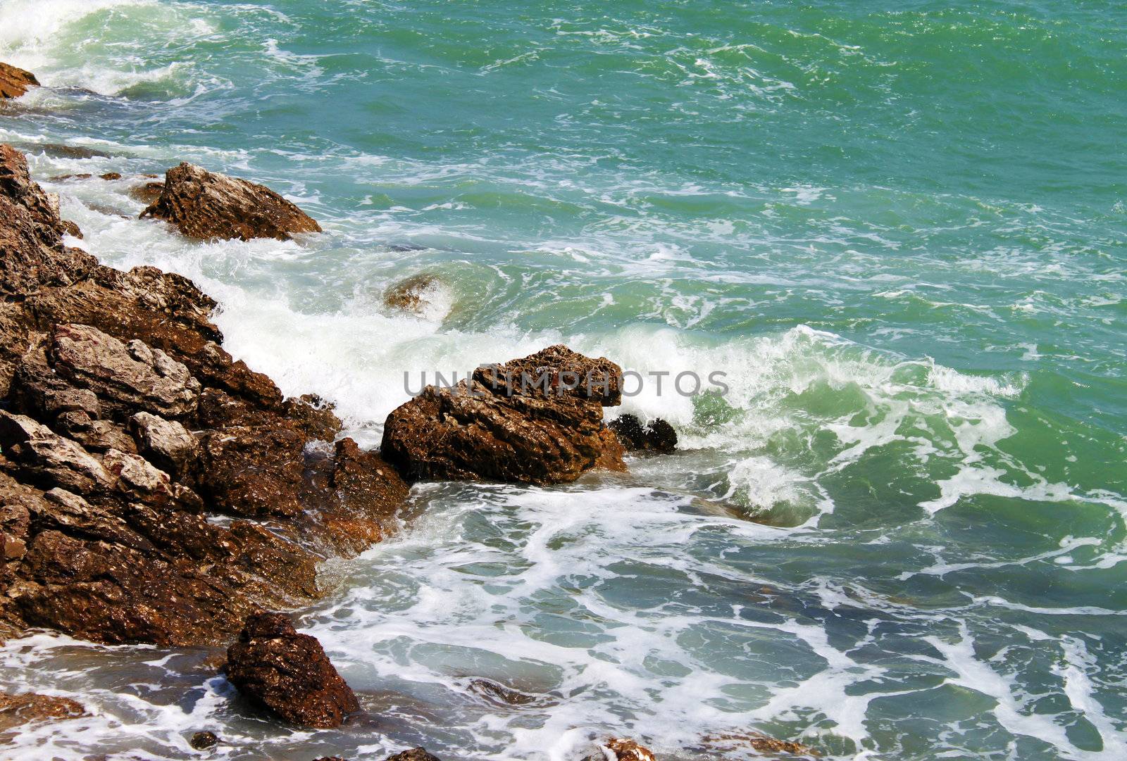 Sea stones splash wave
