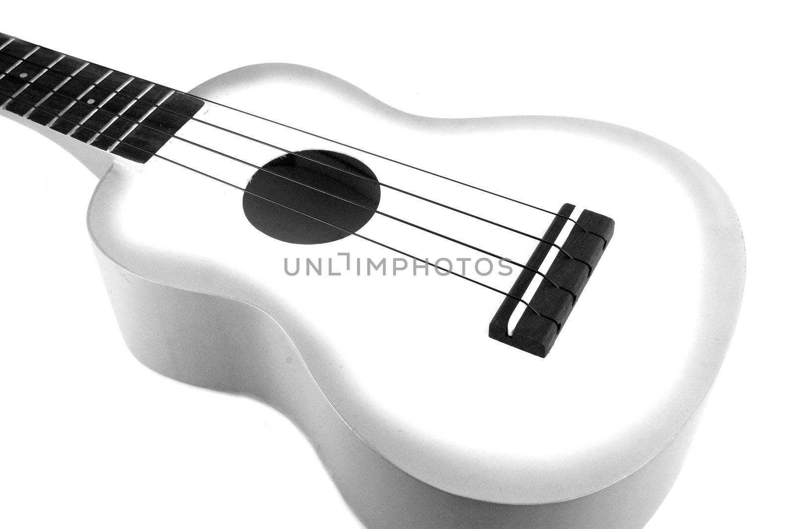 Ukulele guitar on white background