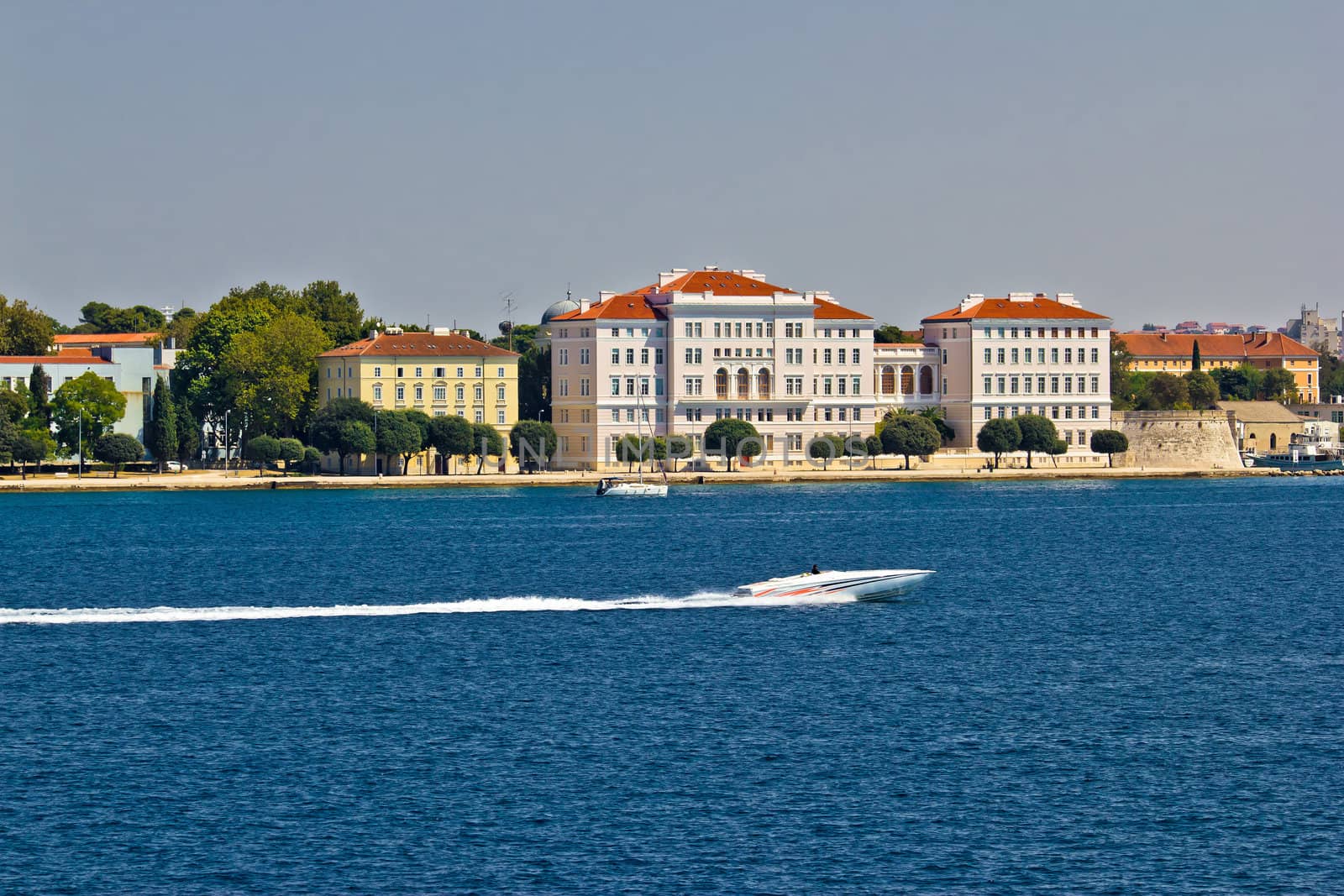 Zadar peninsula waterfront with powerboat, Dalmatia, Croatia