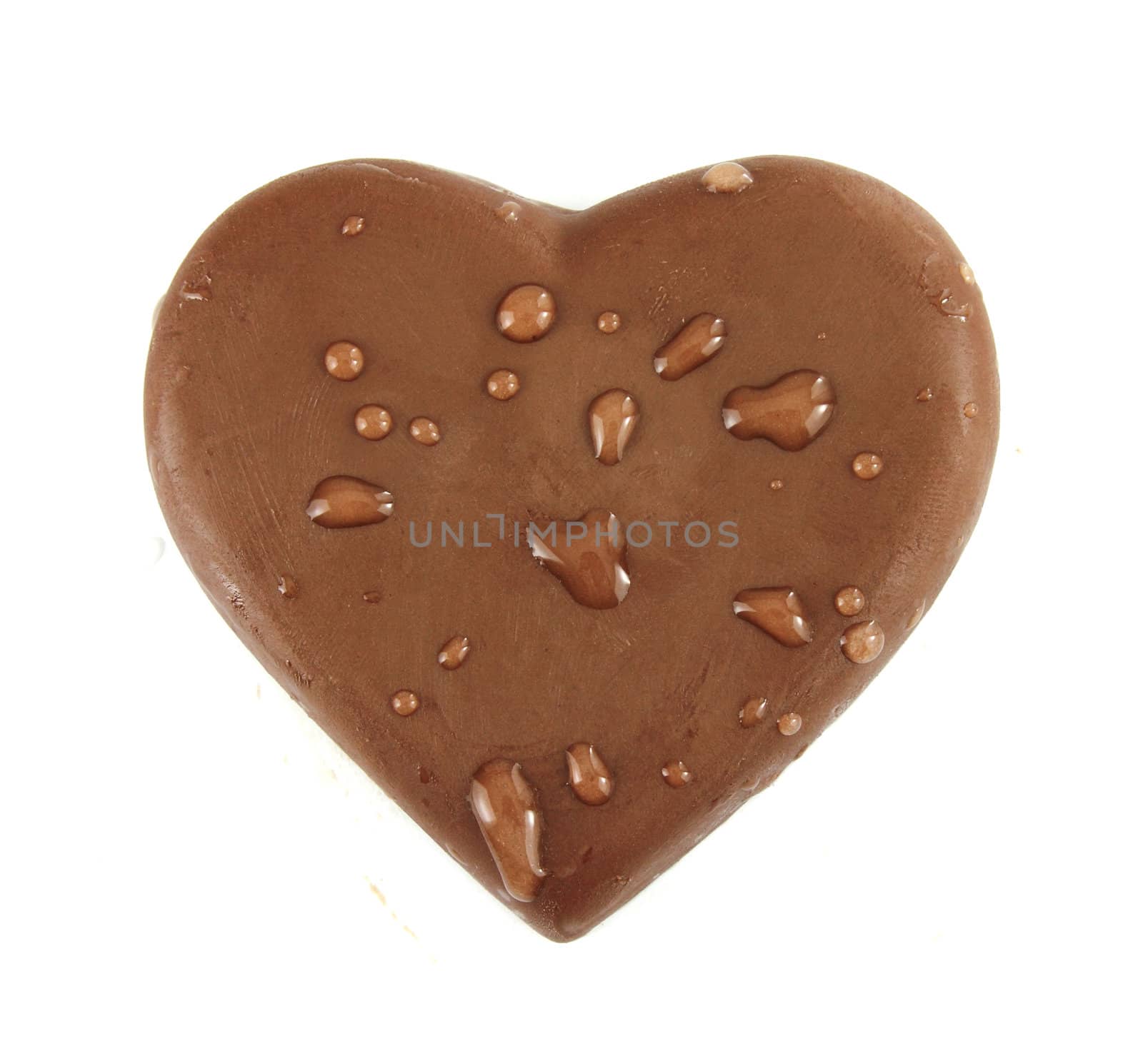 chocolate heart shape with water on white background