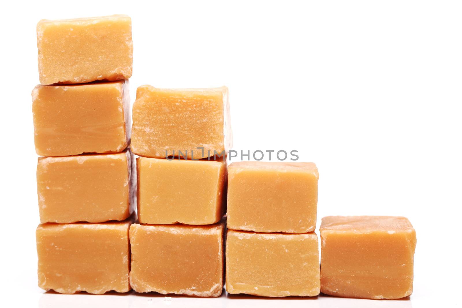 Tasty brown butterscotch isolated on a white