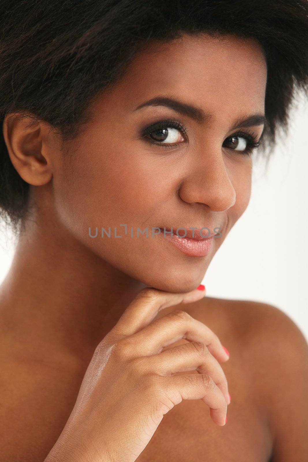 Beautiful and attractive black woman portrait isolated on a white