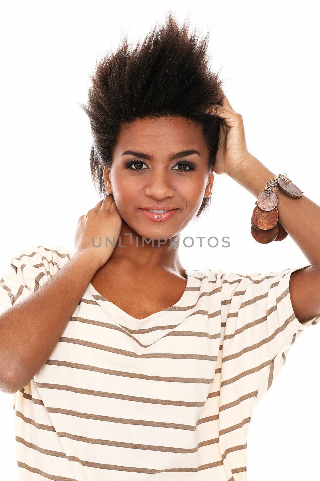 Young smiling black woman in studio isolated on a white