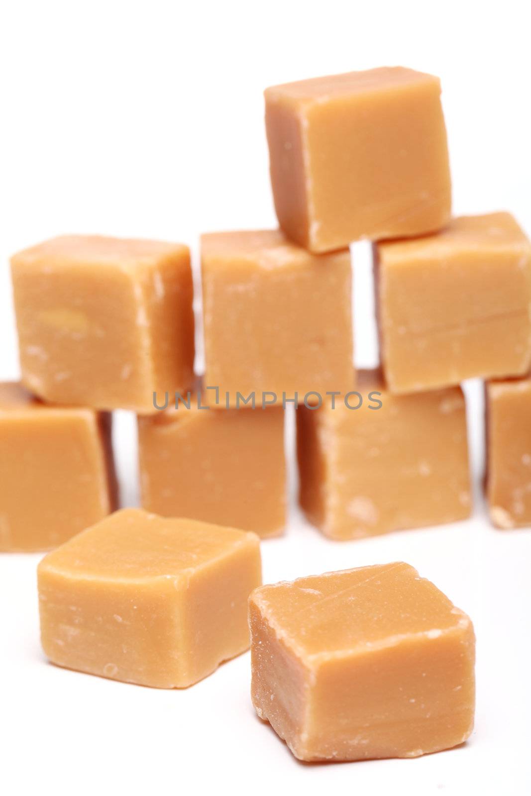 Tasty brown butterscotch isolated on a white