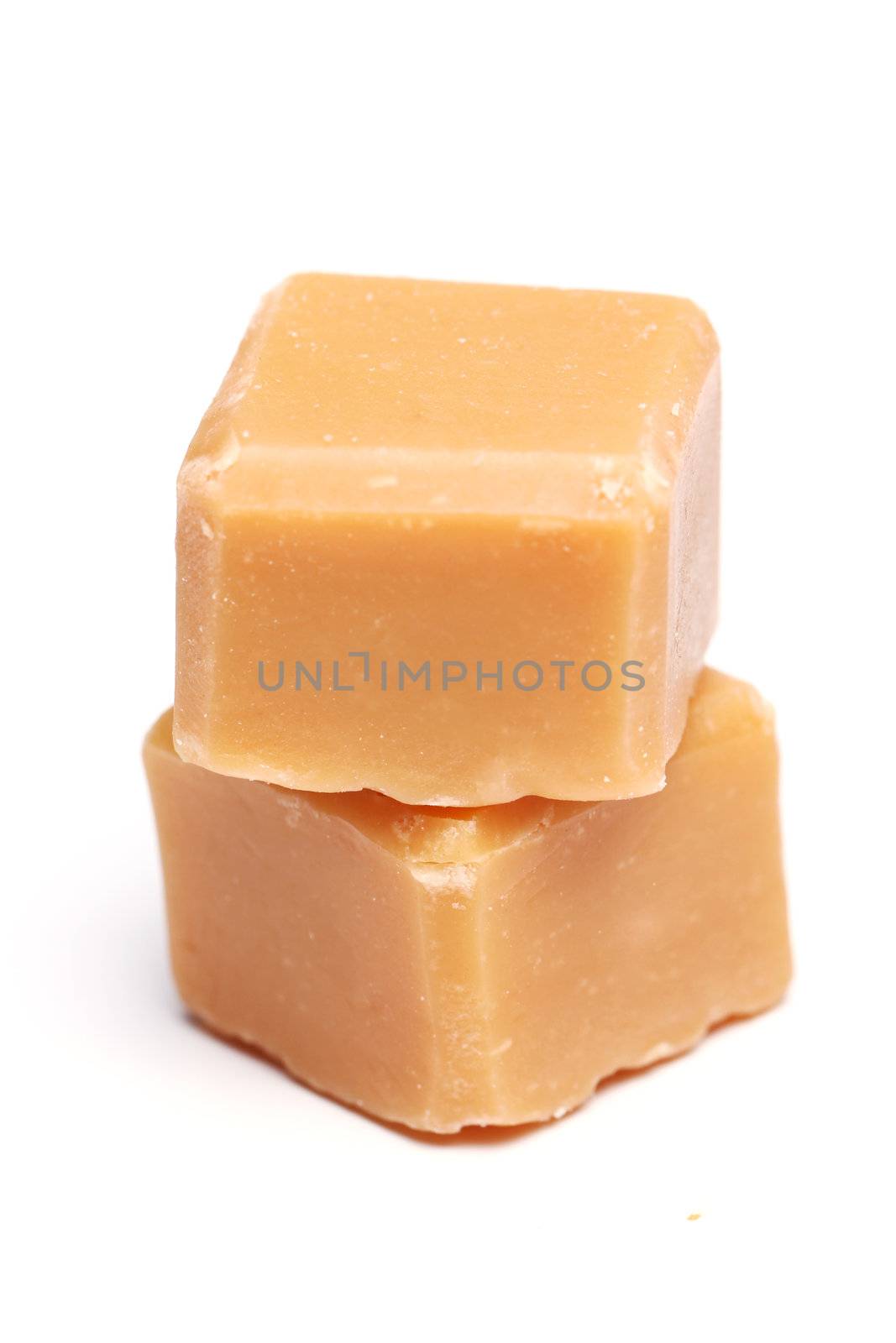 Tasty brown butterscotch isolated on a white