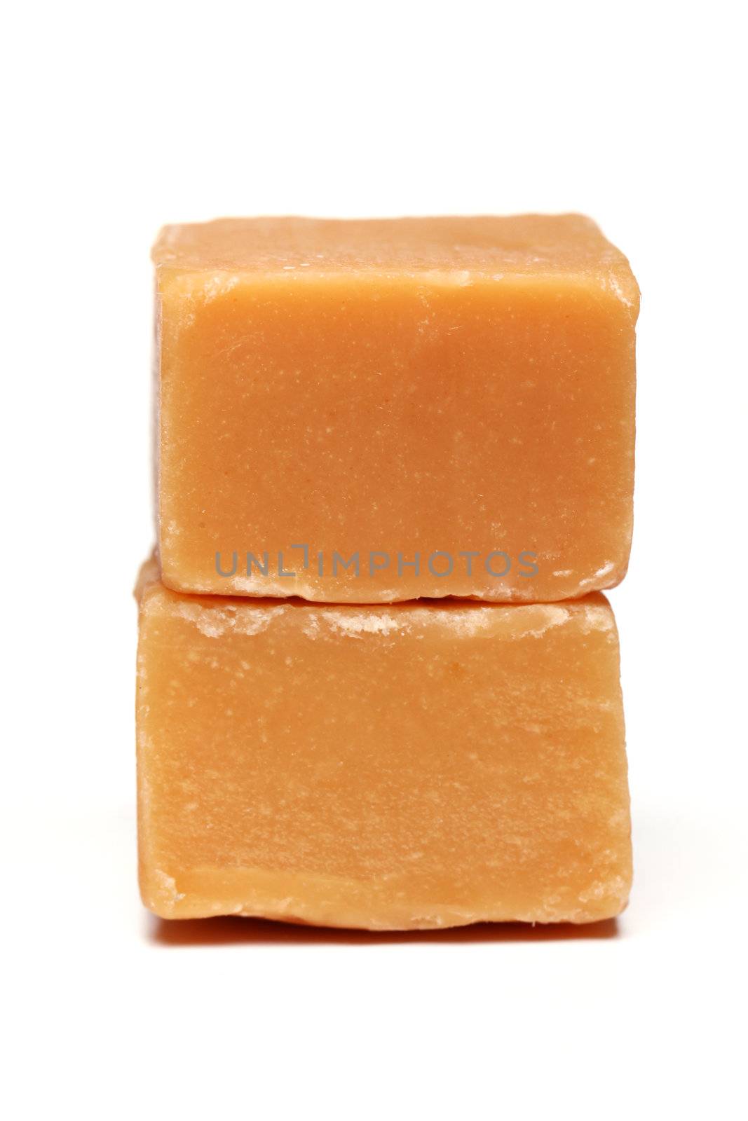 Tasty brown butterscotch isolated on a white