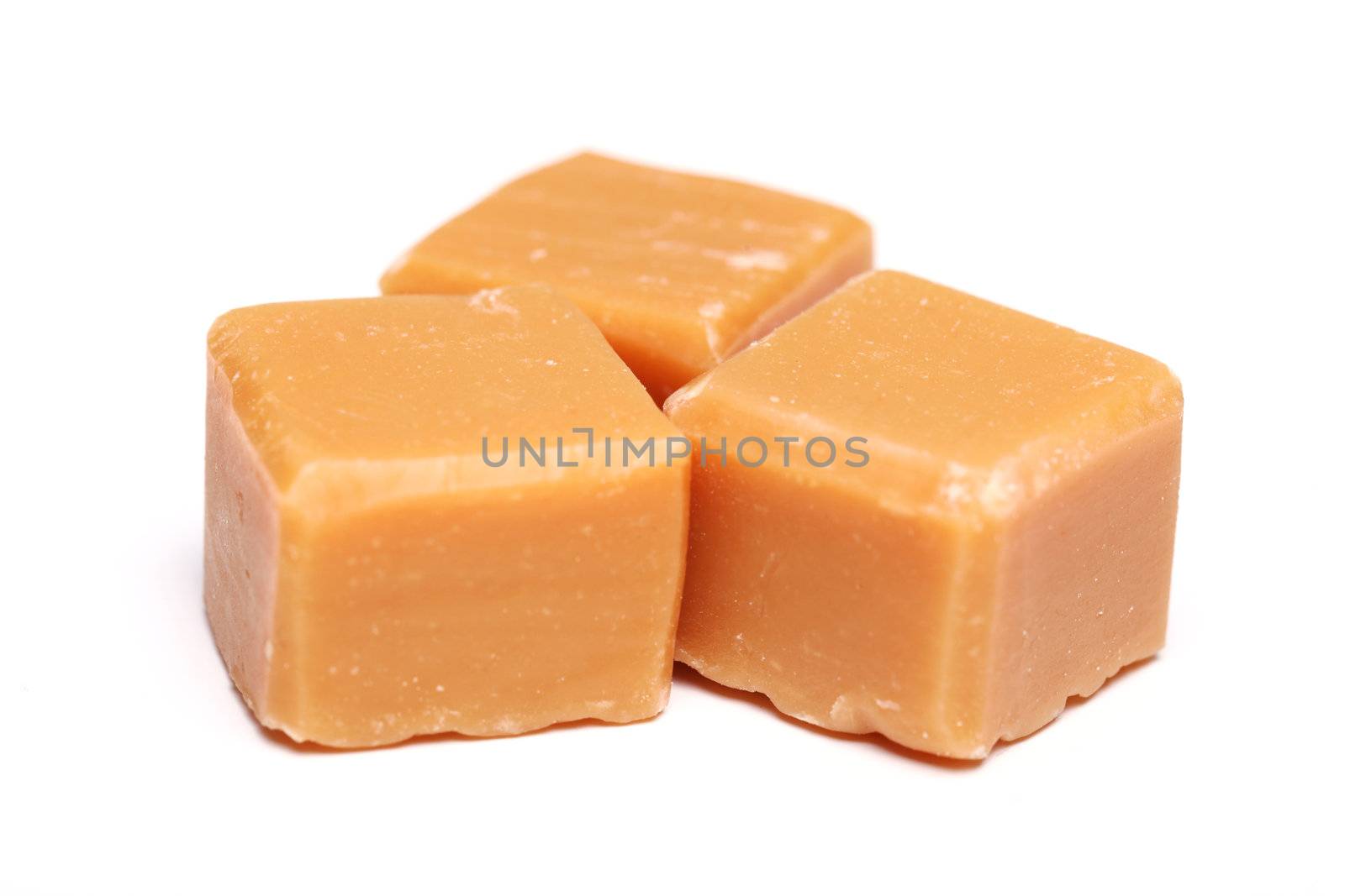 Tasty brown butterscotch isolated on a white