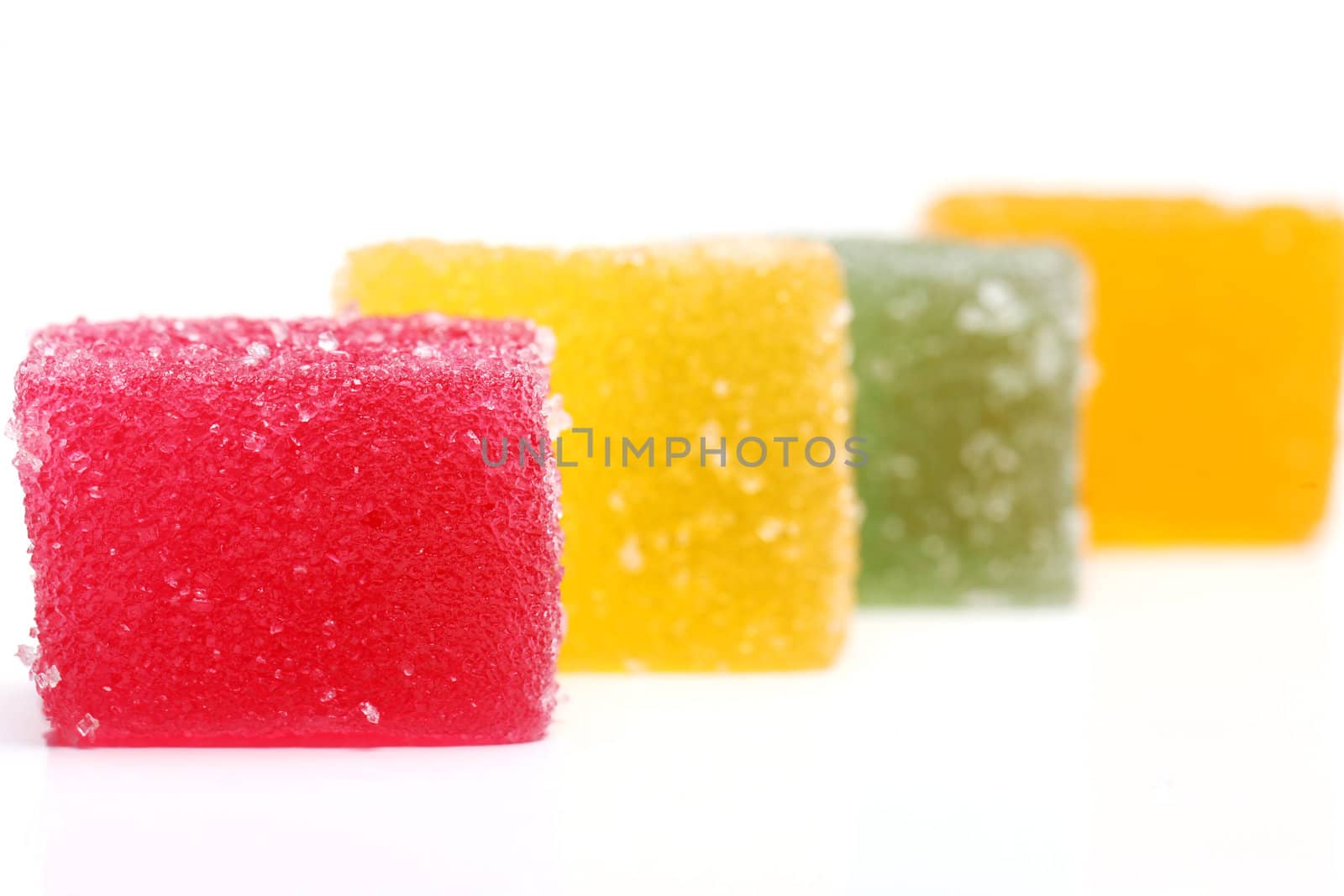 Delicious and colored marmalade isolated on a white