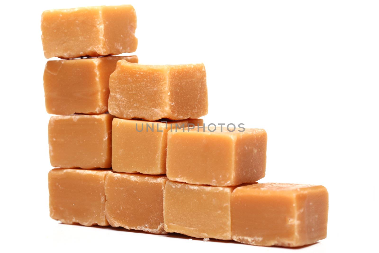 Tasty brown butterscotch isolated on a white