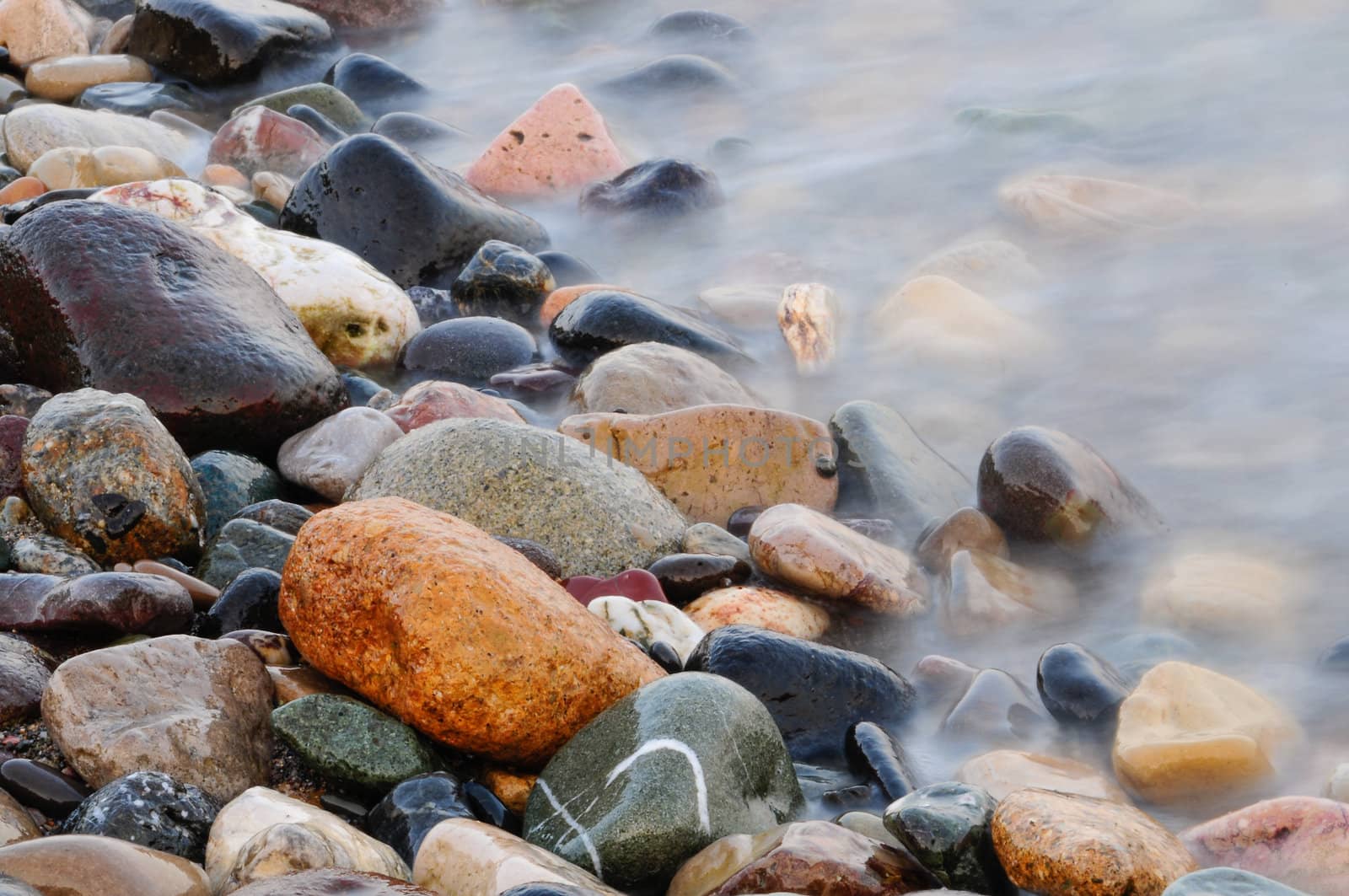 Wet stones with long exposure in sea