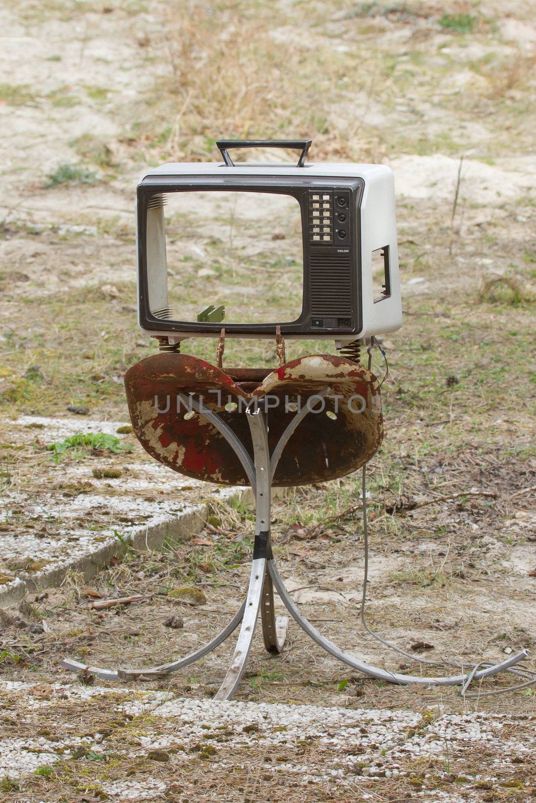 Grungy old TV set without a screen  by michaklootwijk