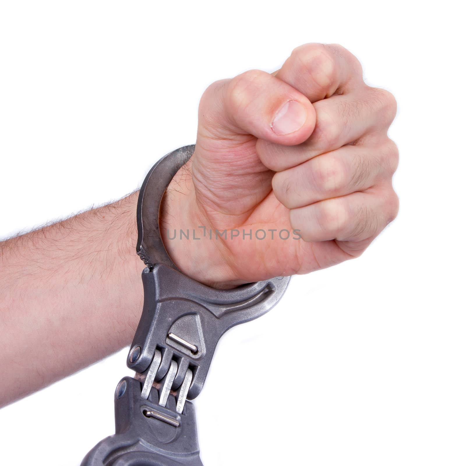 A man in metal handcuffs on a white background by michaklootwijk