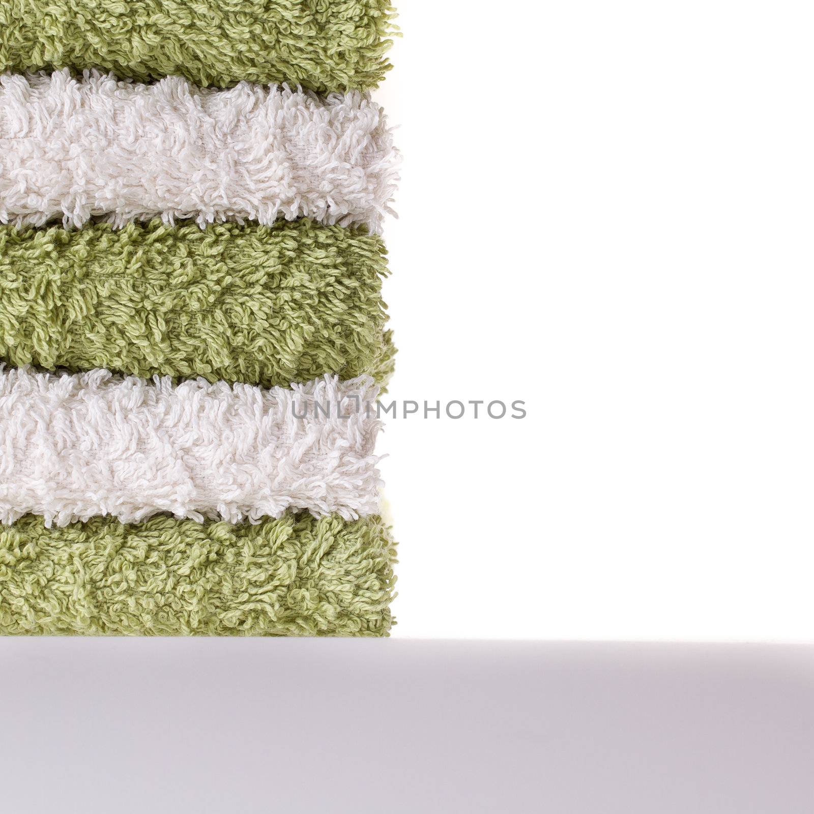 Green and white towels by michaklootwijk