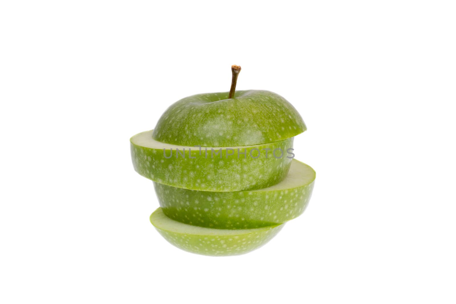 A sliced green apple isolated on a white background