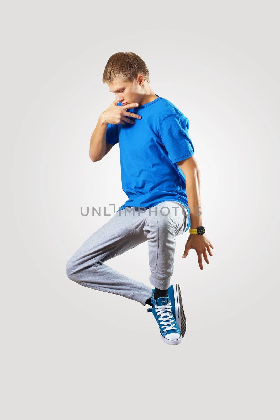 Young hiphop dancer making a move on white