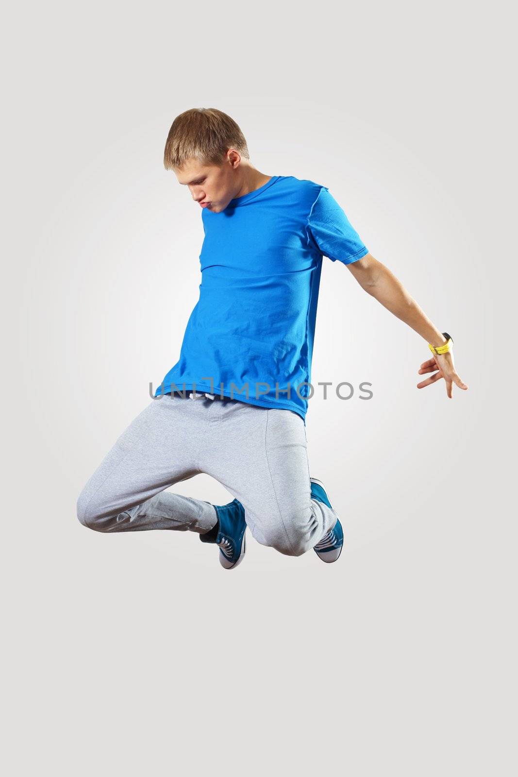 Young hiphop dancer making a move on white